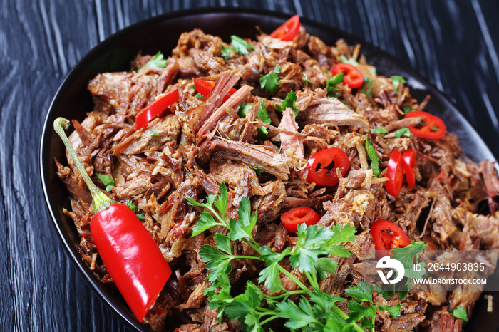 close-up of spicy pulled beef in a bowl