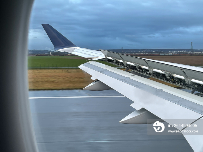 View from the landing window of the new Airbus, a new generation commercial aircraft for holiday tourism that pollutes less and consumes less fuel, ideal for the aviation industry.