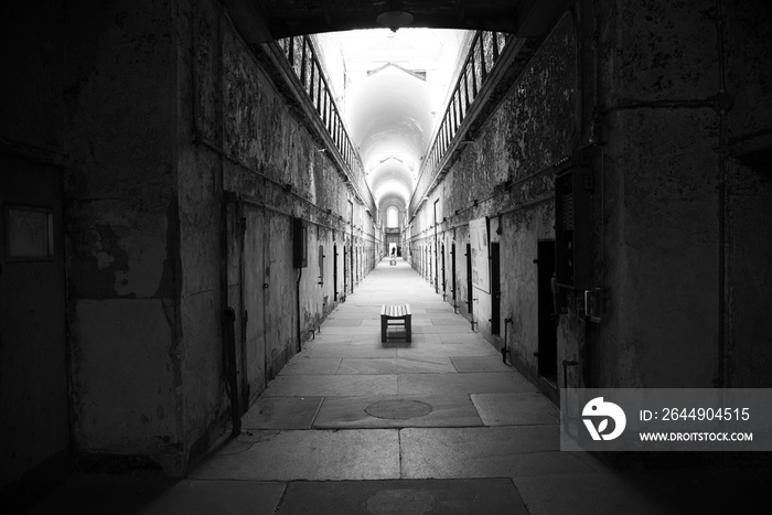 Prison corridor with cells on both sides