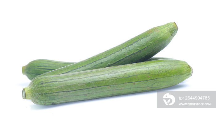 fresh green sponge gourd or luffa with slice isolated on white background