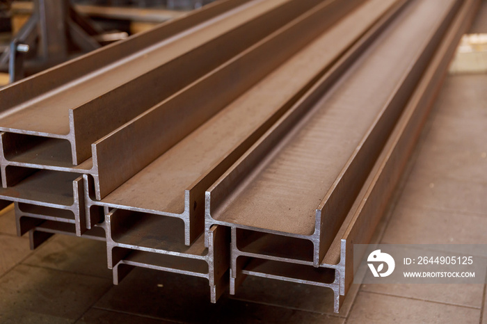 The stack of rolled metal is at the factory, overlooking the steel profile