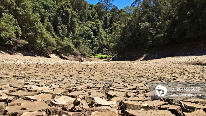 Dry cracked river bed. Drought concept image.