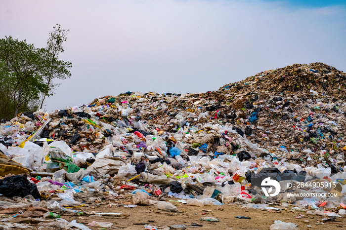 Mountain large garbage pile and pollution,Pile of stink and toxic residue,These garbage come from urban and industrial areas can not get rid of, Consumer society Cause massive waste .