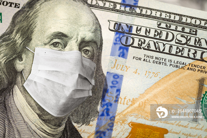 One Hundred Dollar Bill With Medical Face Mask on Benjamin Franklin