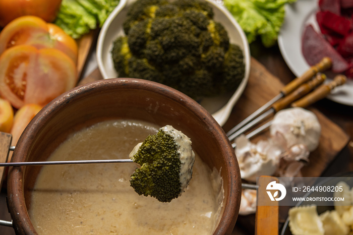 ingredients for bagna cauda sauce with cream and anchovies