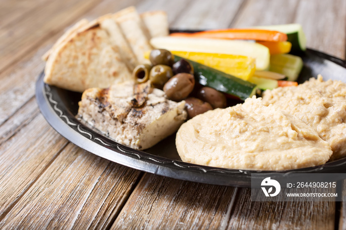 A closeup view of a mezze platter assortment.