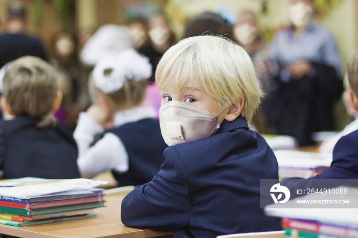 Child boy student in protective mask, back to school