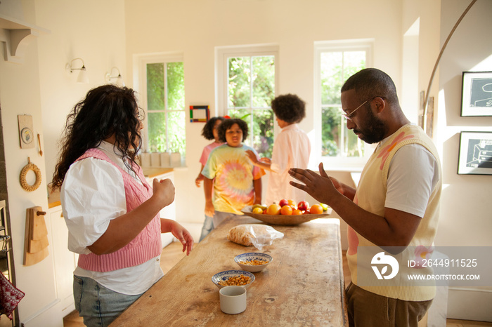 Body positive family having fun in the kitchen