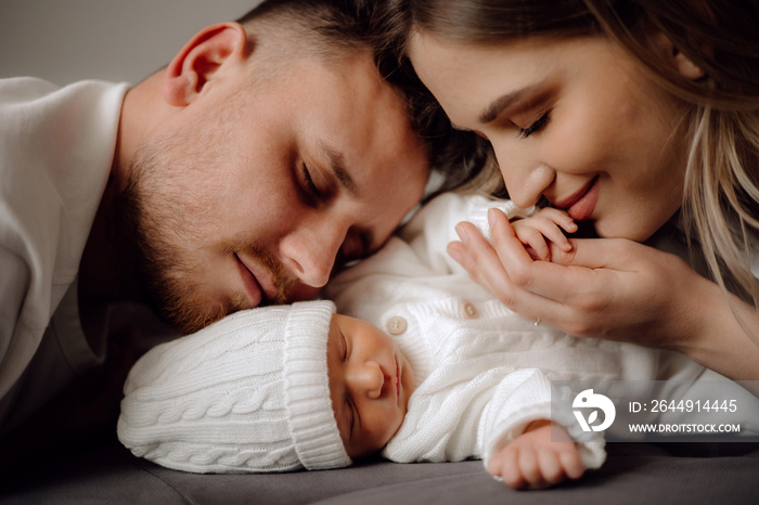 parent and baby, parents and newborn baby. happy family