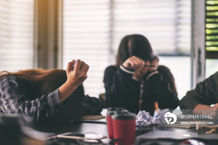 Businesspeople get stressed while having a problem in business meeting