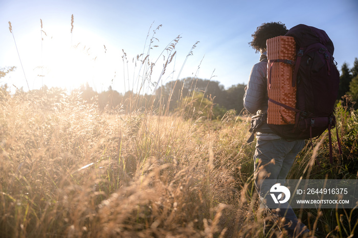 U.S. Army female soldier putting in the miles with an early morning hike in the NorthWest.