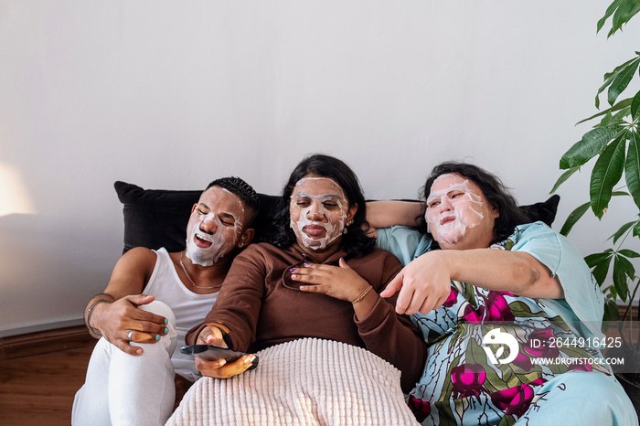 Friends doing face masks together at home