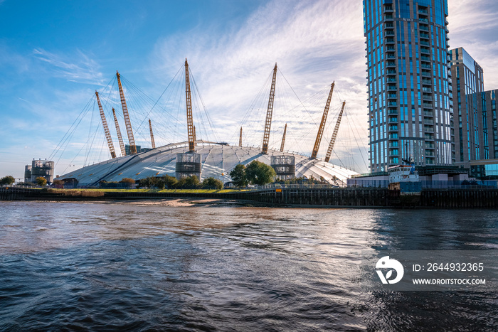 View from the river Thames over Millennium dome or O2 Arena in London, UK.