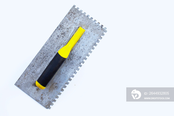 Notched Trowel on white background.