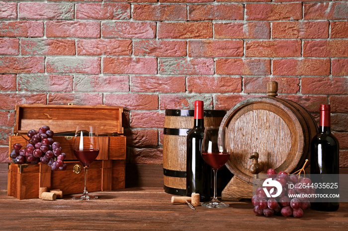 Composition of red wine on brick wall background