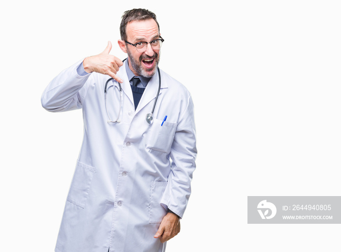 Middle age senior hoary doctor man wearing medical uniform isolated background smiling doing phone gesture with hand and fingers like talking on the telephone. Communicating concepts.