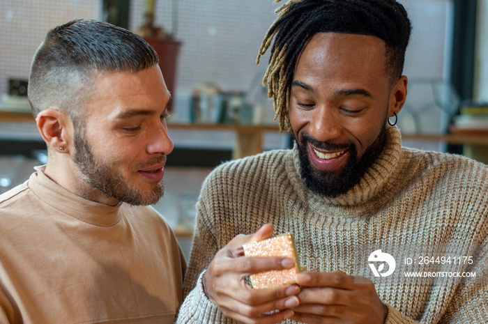 Man giving gift to friend