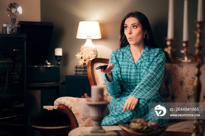 Girl Wearing Pajamas Watching TV in her Room