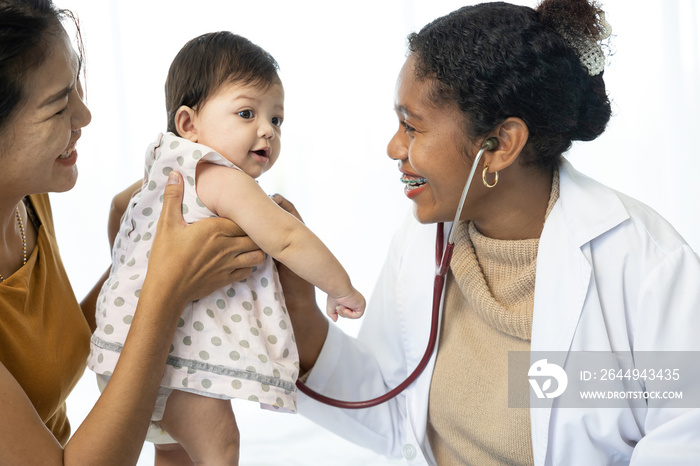 mother and baby visit to the doctor using stethoscope checking heart beat