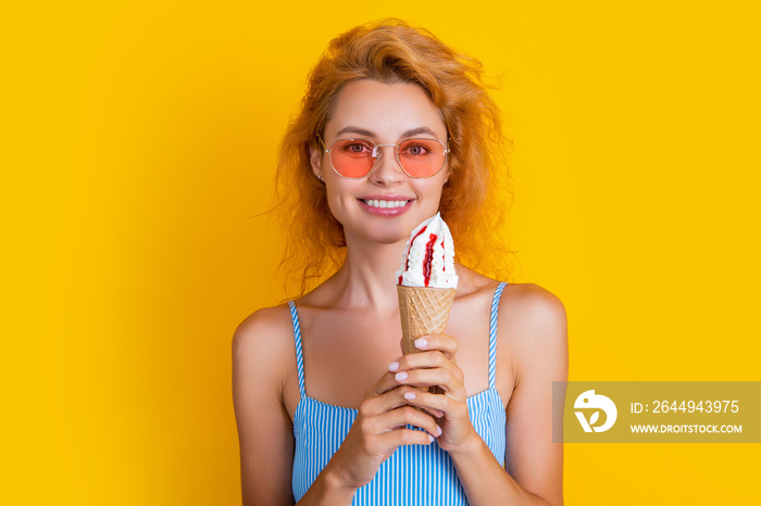 glad woman with cone icecream on background. photo of woman with cone icecream