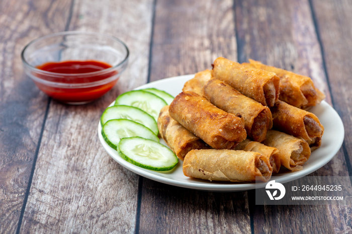 Pork Lumpiang Shanghai (profile shot without place mat ) is a Filipino favorite, its a dish usually served at parties and feasts. This is very similar to a spring roll.