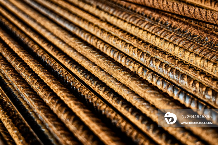 Rusty Reinforced Steel Bars in a Stack with Contrast