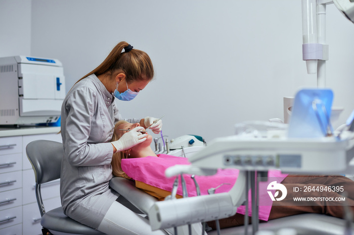 Young woman having dental work done on her teeth