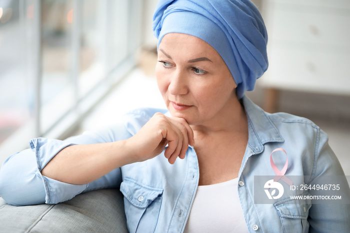 Mature woman after chemotherapy at home