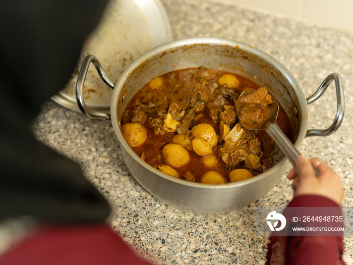 Woman preparing meal form Ramadan at home