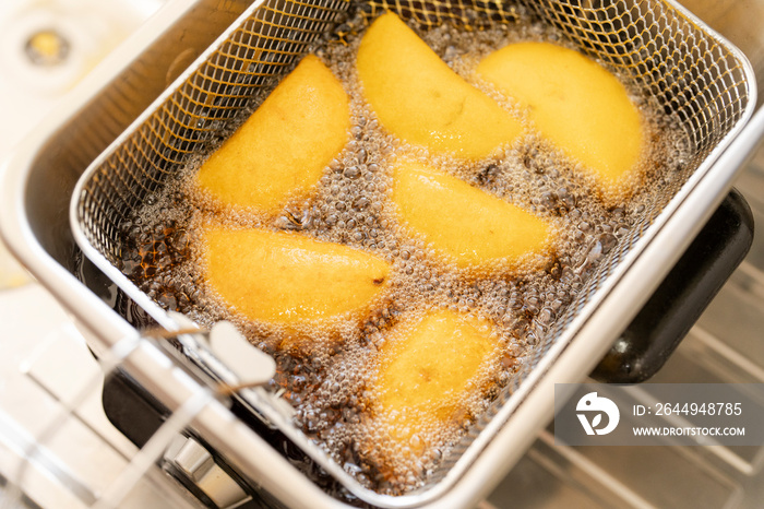 Empanadas deep-fried in oil