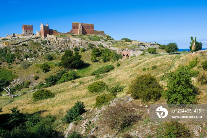 Hammershus castle - the biggest Northern Europe castle ruins situated at steep granite cliff on the Baltic Sea coast, Bornholm, Denmark