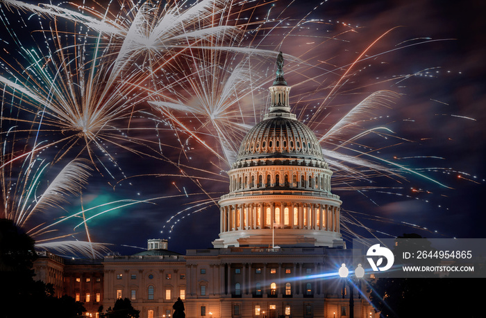 July 4th Independence day show cheerful fireworks display on the U.S. Capitol Building in Washington DC USA