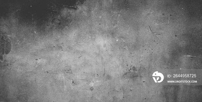 Black concrete wall or dark gray rough grainy stone texture background.