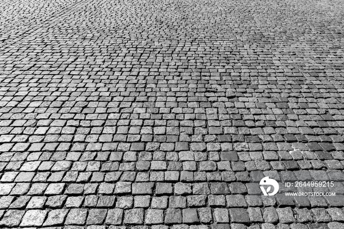 Old pavement of granite texture.