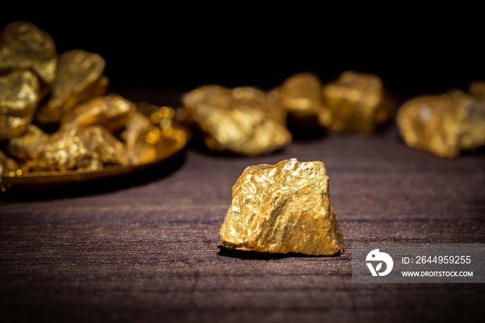 Gold concept, close-up of large gold nuggets