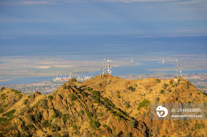 North Peak as seen at sunset from the top of Mt Diablo; San Joaquin river and Antioch in the background, Mt Diablo State Park, Contra Costa county, San Francisco bay area, California