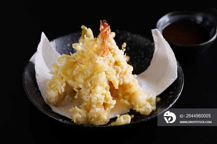 Shrimp tempura Japanese food isolated on a black background