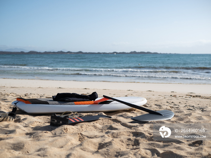 Hydrofoil surfing equipment unmounted on the beach