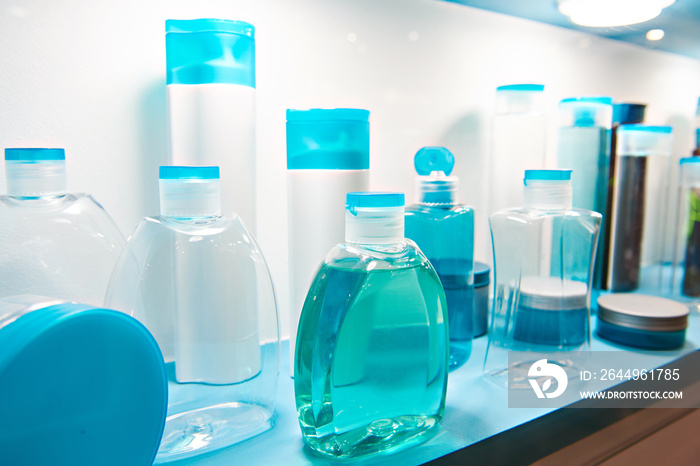 Showcase shop with plastic bottles shampoo