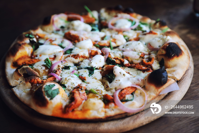 Tandoori Chicken Pizza on wooden table