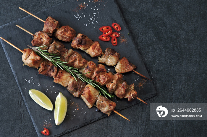 Appetizing kebab on wooden sticks. Keto Paleo. Pegan Diet.