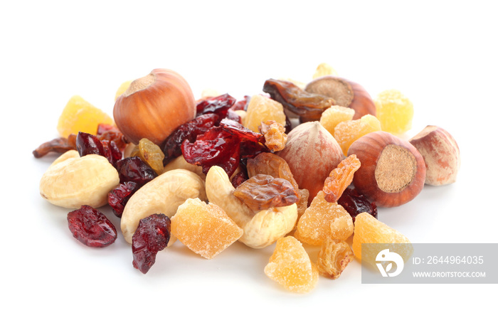 Different dried fruits and nuts on white background