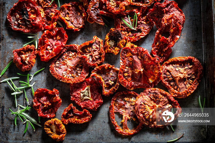 Closeup of tomatoes dried on baking tray