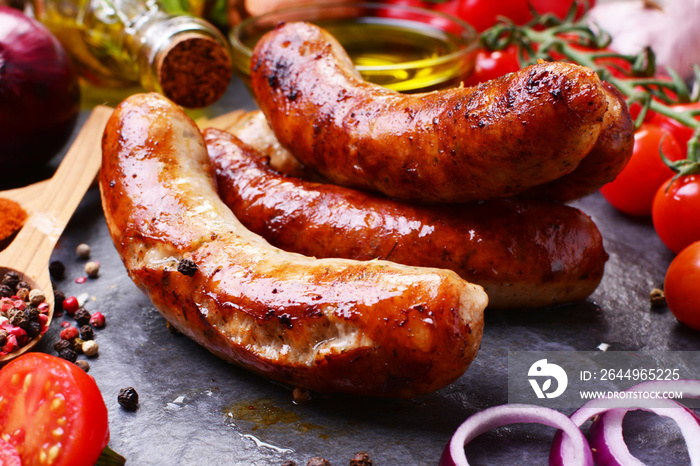 Pork sausages with spices and vegetables