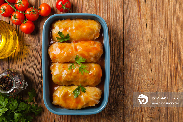 Traditional stuffed cabbage with minced meat and rice, served in a tomato sauce.