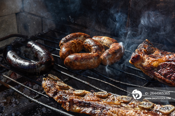 Barbecue, grilled sausages and cow meat , traditional argentine cuisine