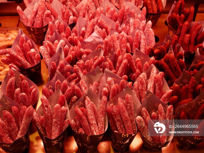 Top view of sausages in bags at Mercado de San Miguel in Madrid, Spain.