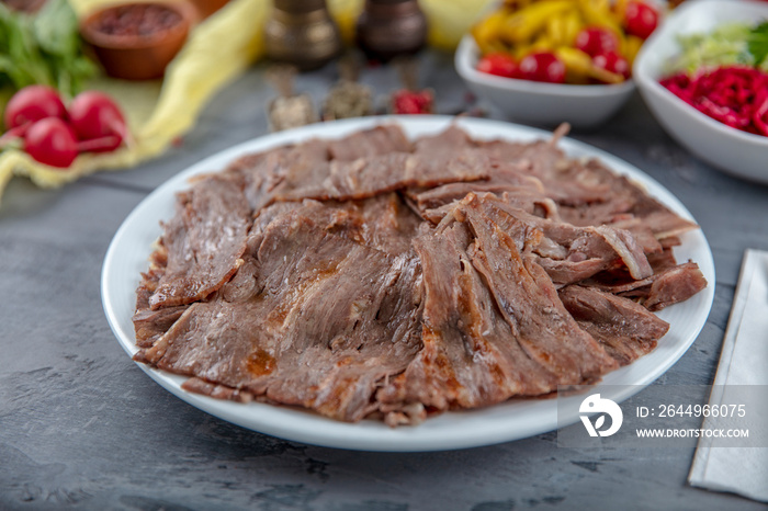 Turkish Doner Kebab on plate. Arabic traditional doner with pita bread / lavash. Protein nutrition, clean eating, diet concept. Turkish, greek or middle eastern style doner kebab food restaurant.