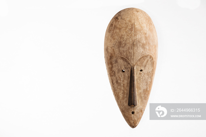 African mask from Gabon on a white background