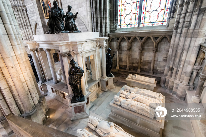 The tomb of Henry II and Catherine de’ Medici and recumbent sculptures of the other kings of France in Basilica Cathedral of Saint-Denis, Paris